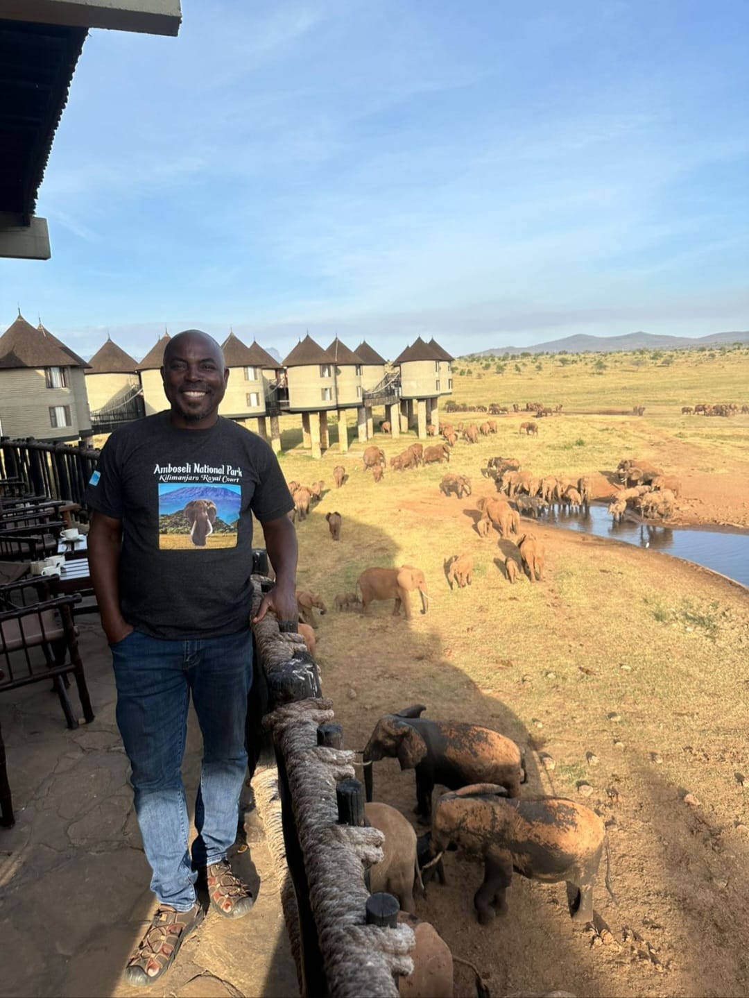 Francis, founder of Gransafaris, smiling in the Kenyan savannah